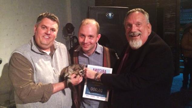 Bob, Eric, Miss Marple and Wil holding $6,000 certificate